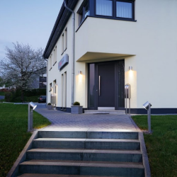 Recessed ground lights leading up to home, outdoors